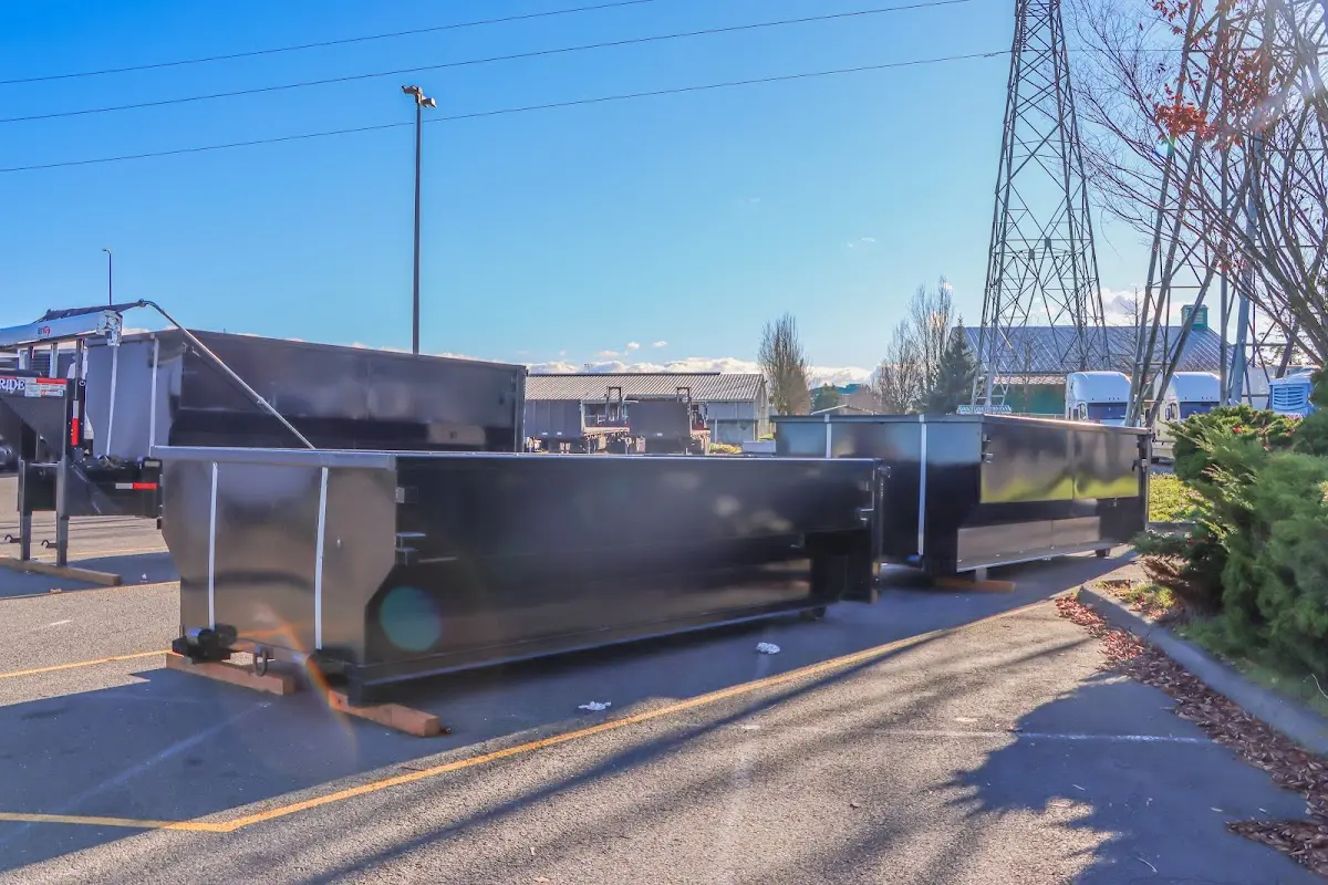 Roll-off dumpster ready for waste disposal at job site for Concrete Dumpster Rental in East Longmeadow